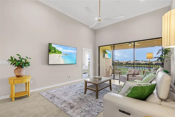 a living room with furniture and a window