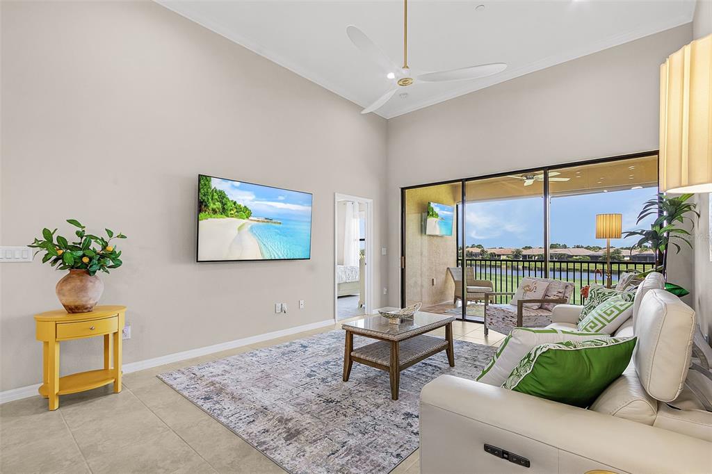13725 Messina Loop, Unit 201 Bradenton, FL 34211 - Photo 11 of 39 a living room with furniture and a window