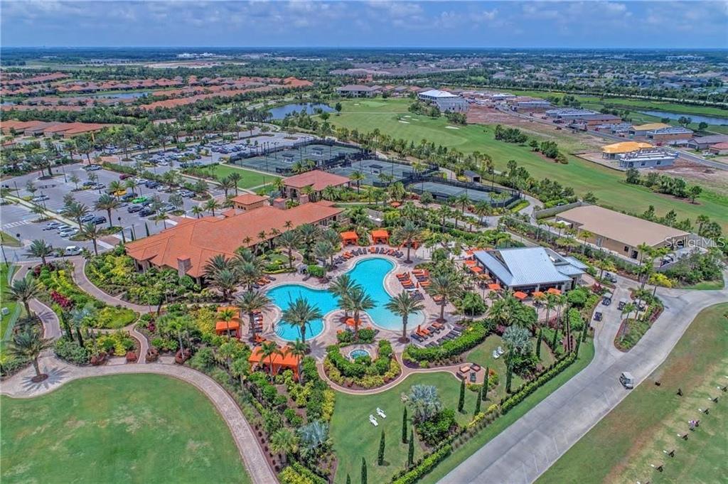 13725 Messina Loop, Unit 201 Bradenton, FL 34211 - Photo 38 of 39 an aerial view of residential houses with outdoor space