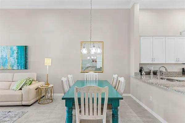 a view of a livingroom with furniture and windows