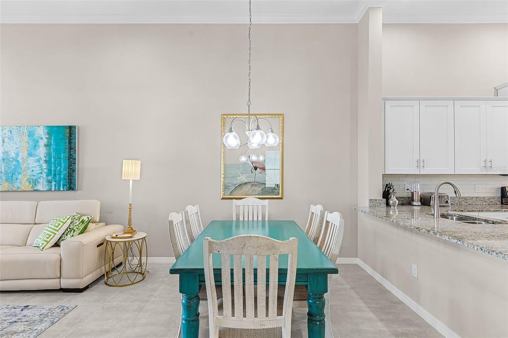 13725 Messina Loop, Unit 201 Bradenton, FL 34211 - Photo 9 of 39 a view of a livingroom with furniture and windows