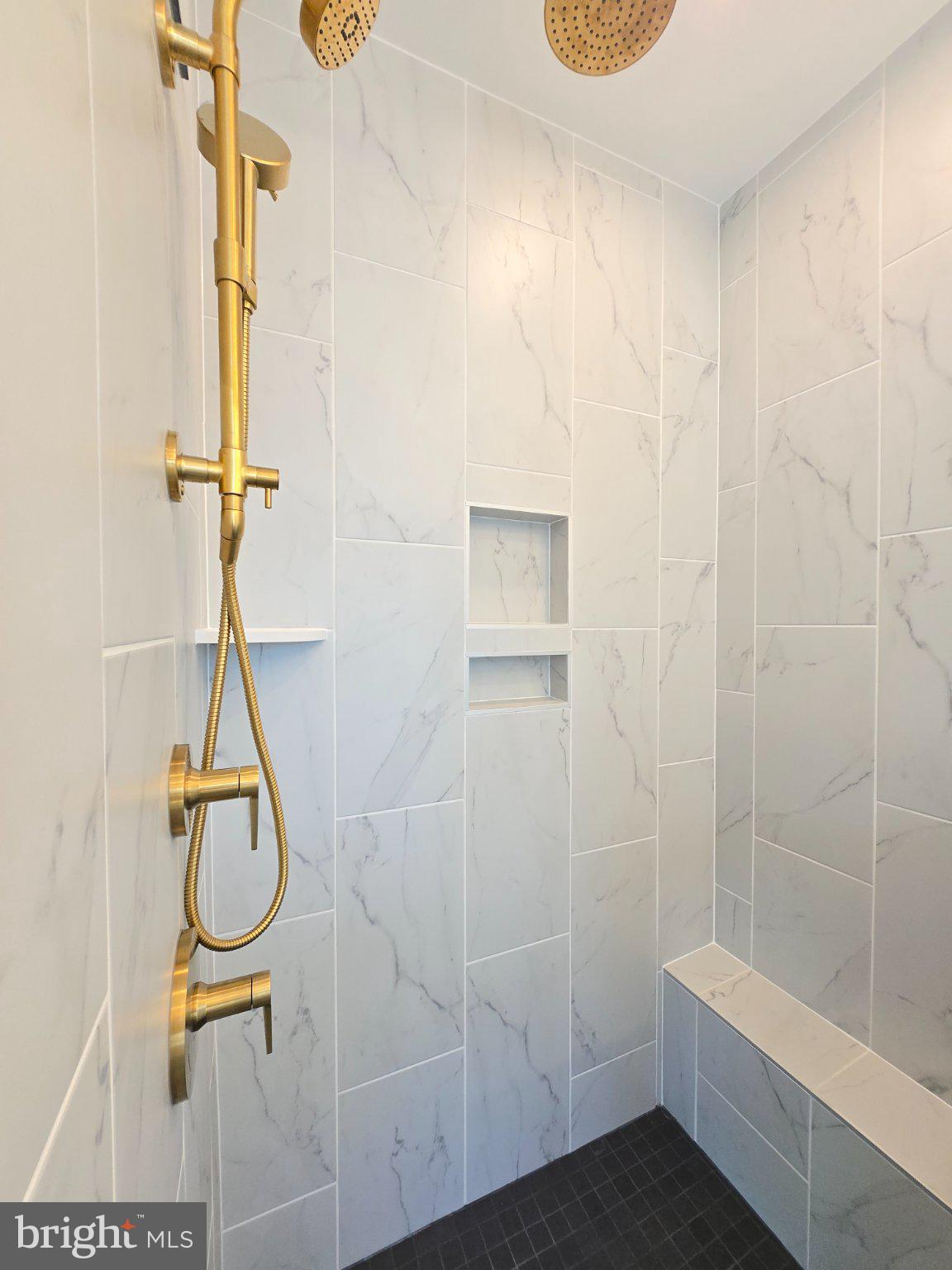 2106 Tysons Ridgeline Road Falls Church, VA 22043 - Photo 14 of 40 Elegant shower with gold accents.