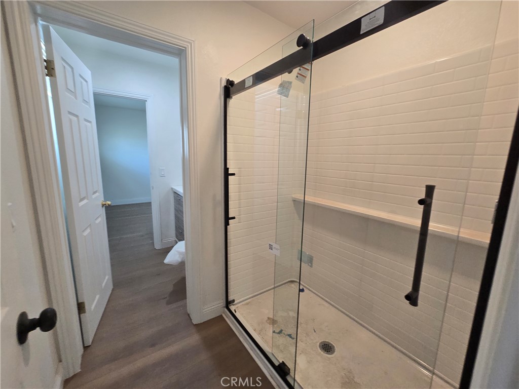 876 River Drive Norco, CA 92860 - Photo 18 of 22 a bathroom with a shower and toilet