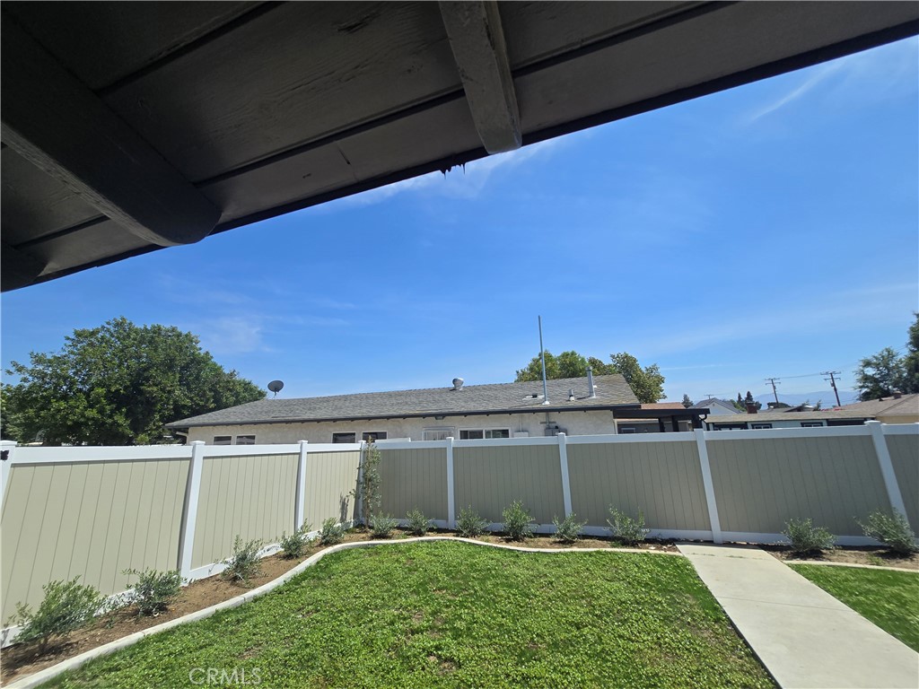 876 River Drive Norco, CA 92860 - Photo 19 of 22 a front view of a house with a yard