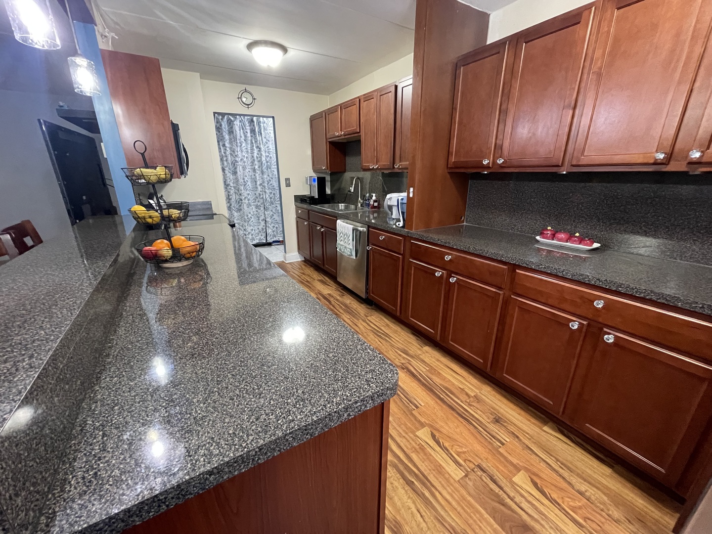 225 South Rohlwing Road, Unit 114 Palatine, IL 60074 - Photo 11 of 18 a kitchen with stainless steel appliances granite countertop a sink stove and cabinets