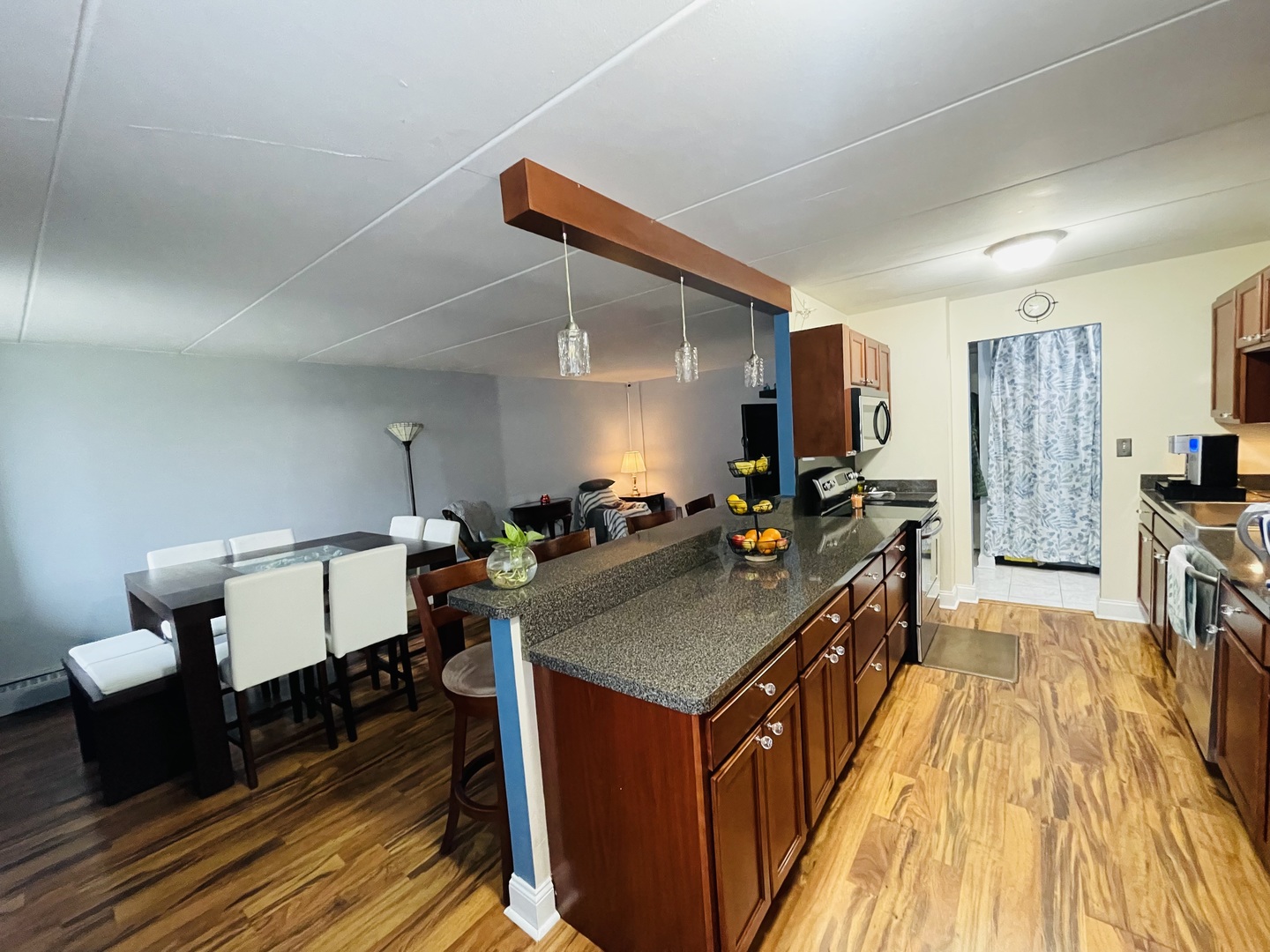 225 South Rohlwing Road, Unit 114 Palatine, IL 60074 - Photo 12 of 18 a kitchen with a table and chairs