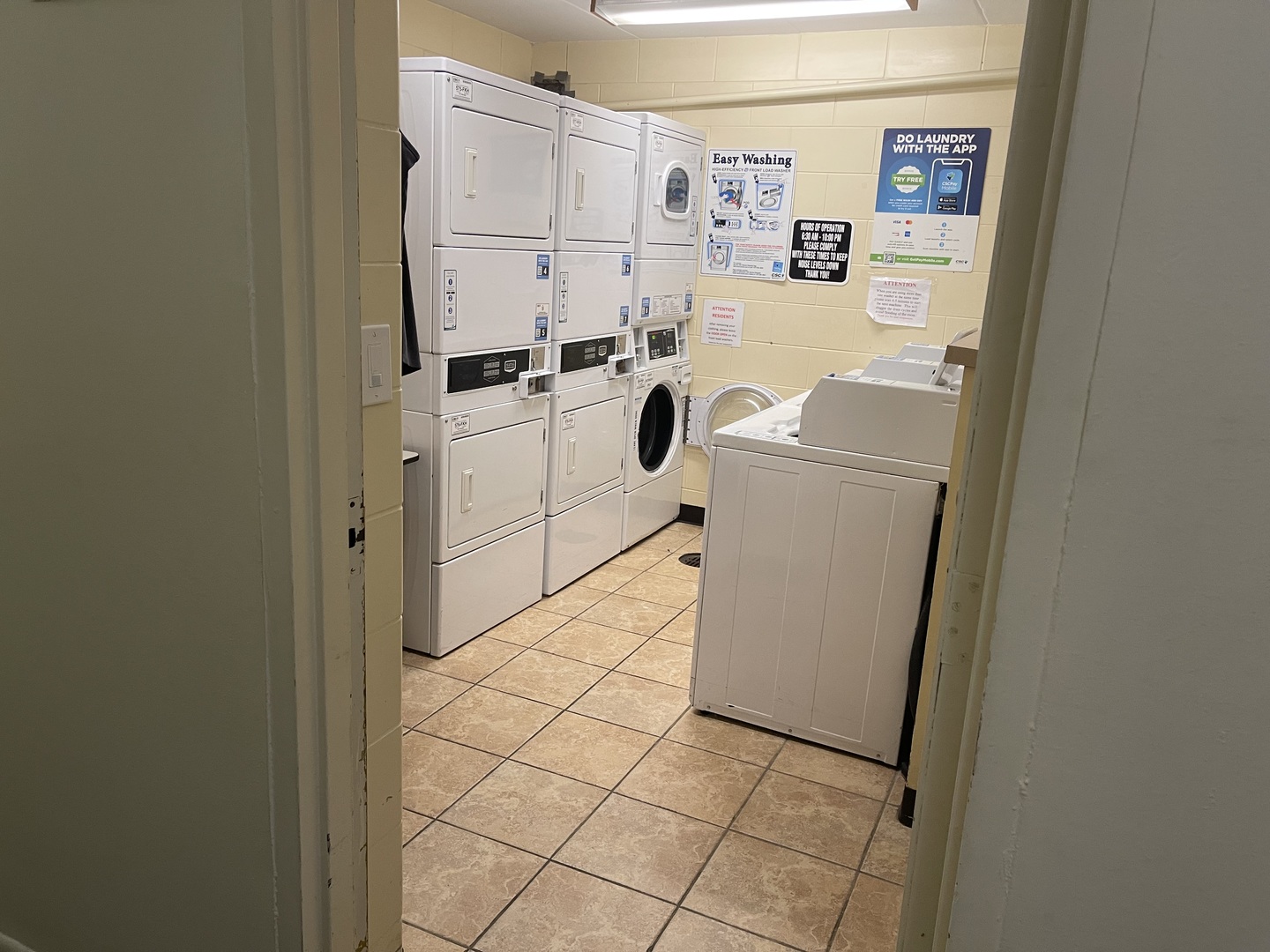 225 South Rohlwing Road, Unit 114 Palatine, IL 60074 - Photo 5 of 18 a utility room with dryer and washer