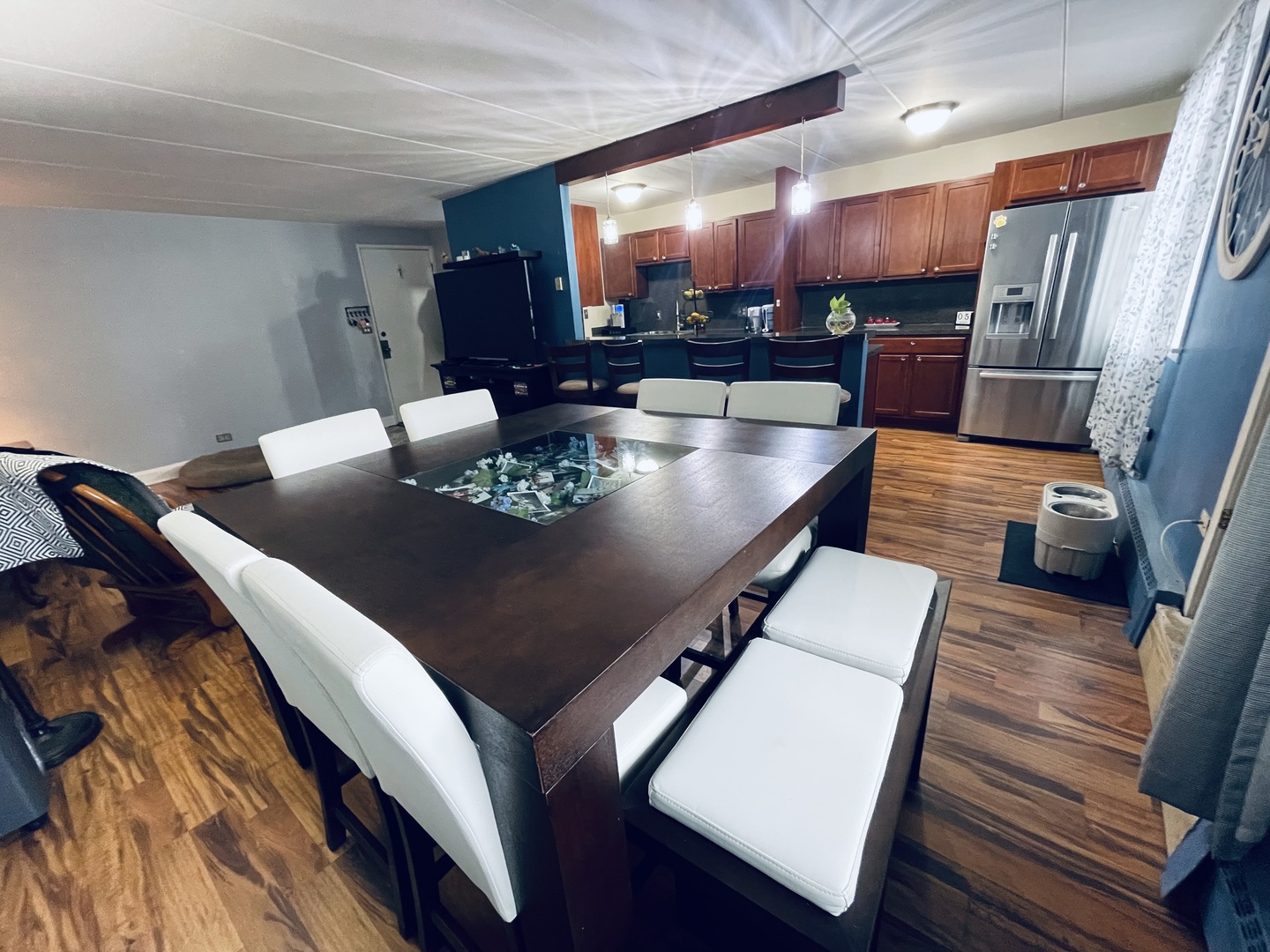 225 South Rohlwing Road, Unit 114 Palatine, IL 60074 - Photo 8 of 18 a view of a dining room with furniture