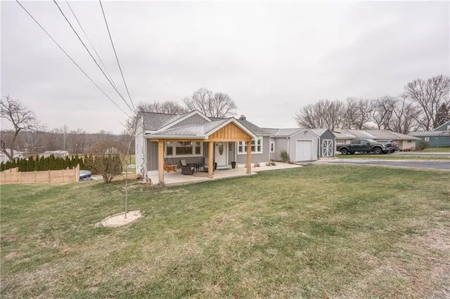 a view of a house with a big yard