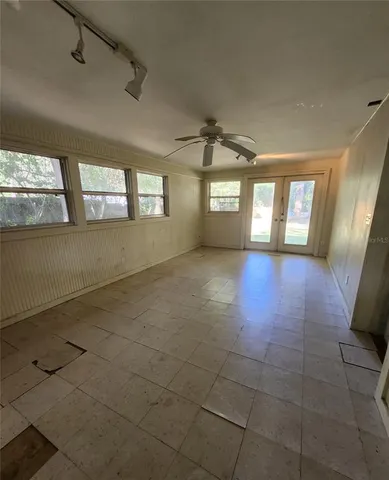 a view of outdoor space with trees all around