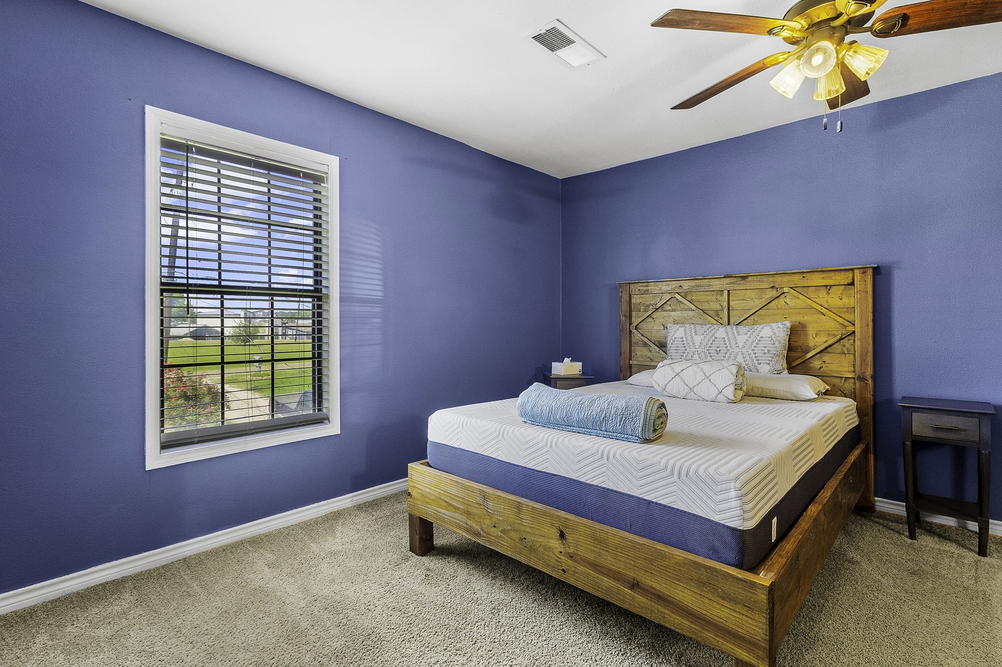 536 Weavers Cove Road Livingston, TX 77351 - Photo 18 of 44 a bedroom with a bed and window