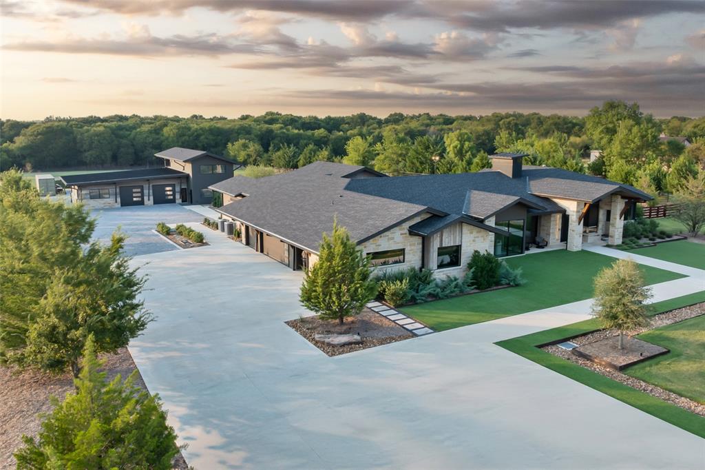 988 English Road Rockwall, TX 75032 - Photo 38 of 40 an aerial view of a house with a big yard