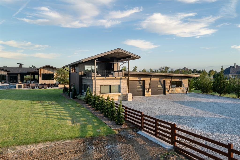 988 English Road Rockwall, TX 75032 - Photo 39 of 40 a view of a house with roof deck front of house