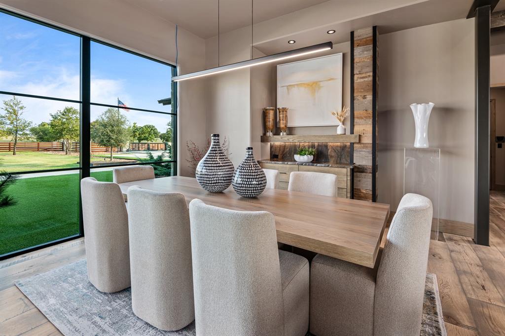 988 English Road Rockwall, TX 75032 - Photo 9 of 40 a dining room with furniture and a large window