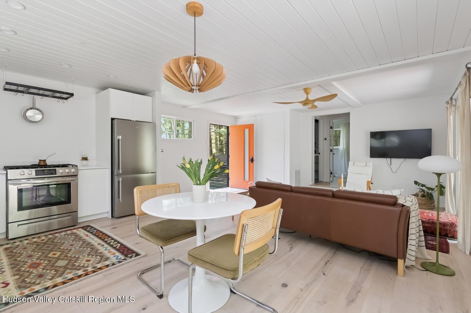 25 Upper Cherrytown Road Kerhonkson, NY 12446 - Photo 14 of 23 a living room with furniture and a flat screen tv