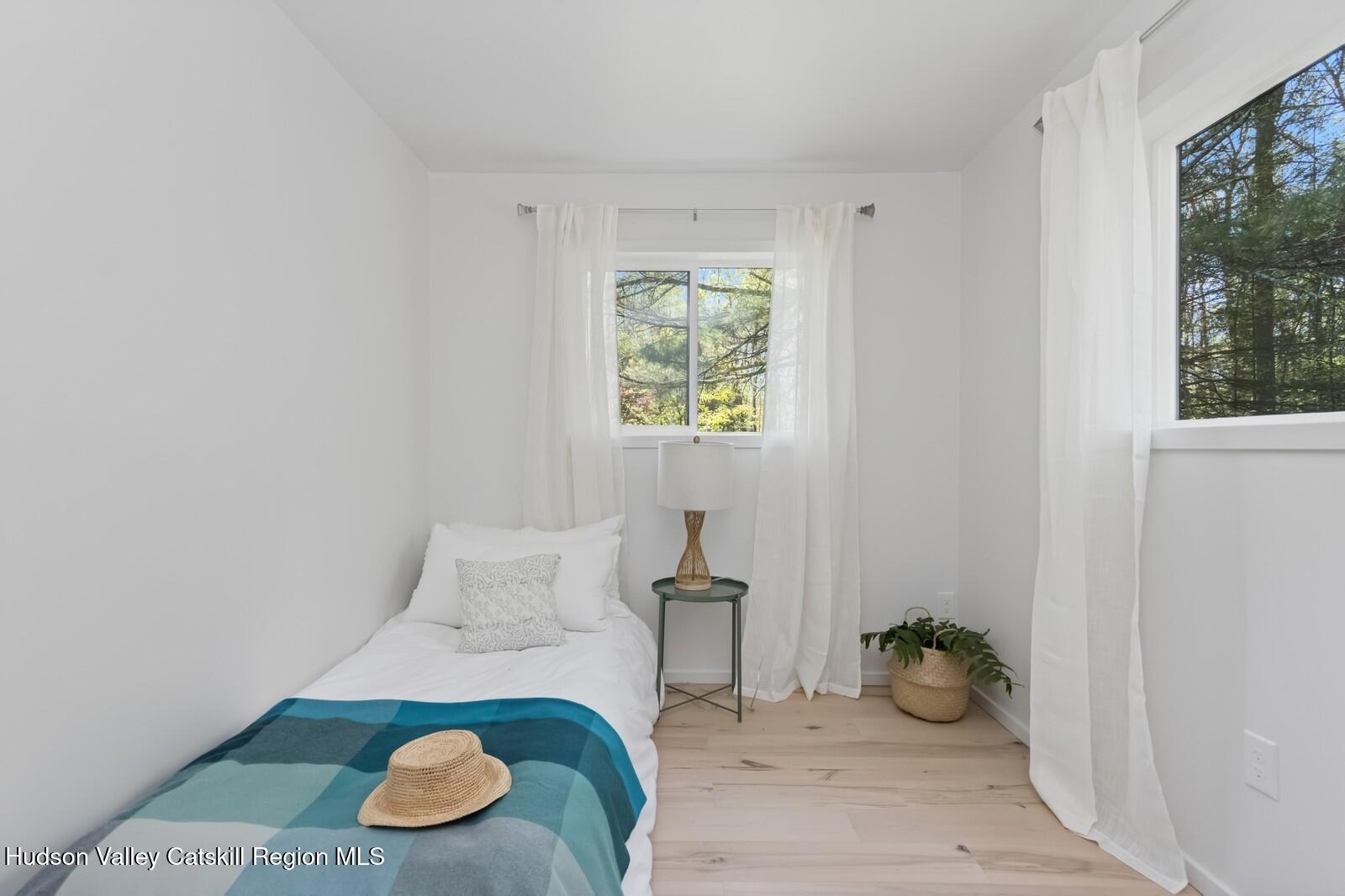 25 Upper Cherrytown Road Kerhonkson, NY 12446 - Photo 20 of 23 a living room with furniture and a window