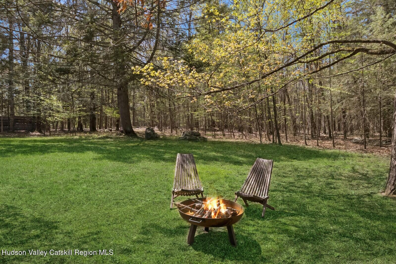 25 Upper Cherrytown Road Kerhonkson, NY 12446 - Photo 22 of 23 a view of a garden with plants and trees