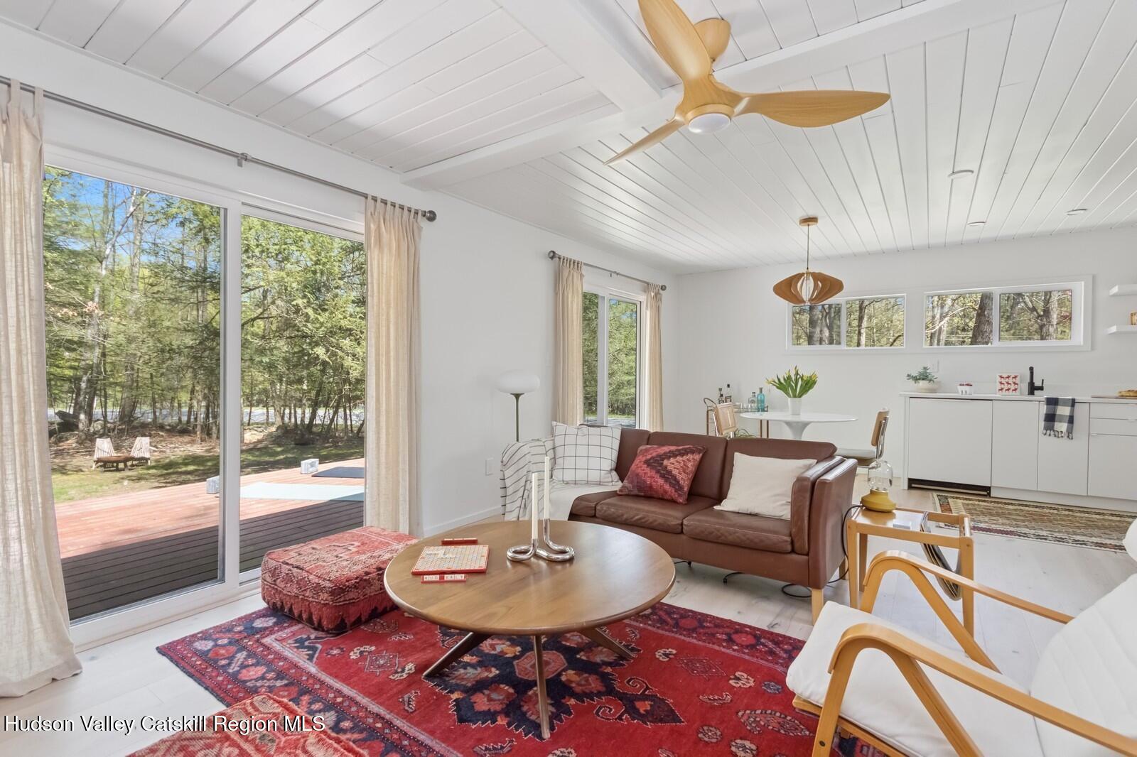 25 Upper Cherrytown Road Kerhonkson, NY 12446 - Photo 3 of 23 a living room with furniture and a large window