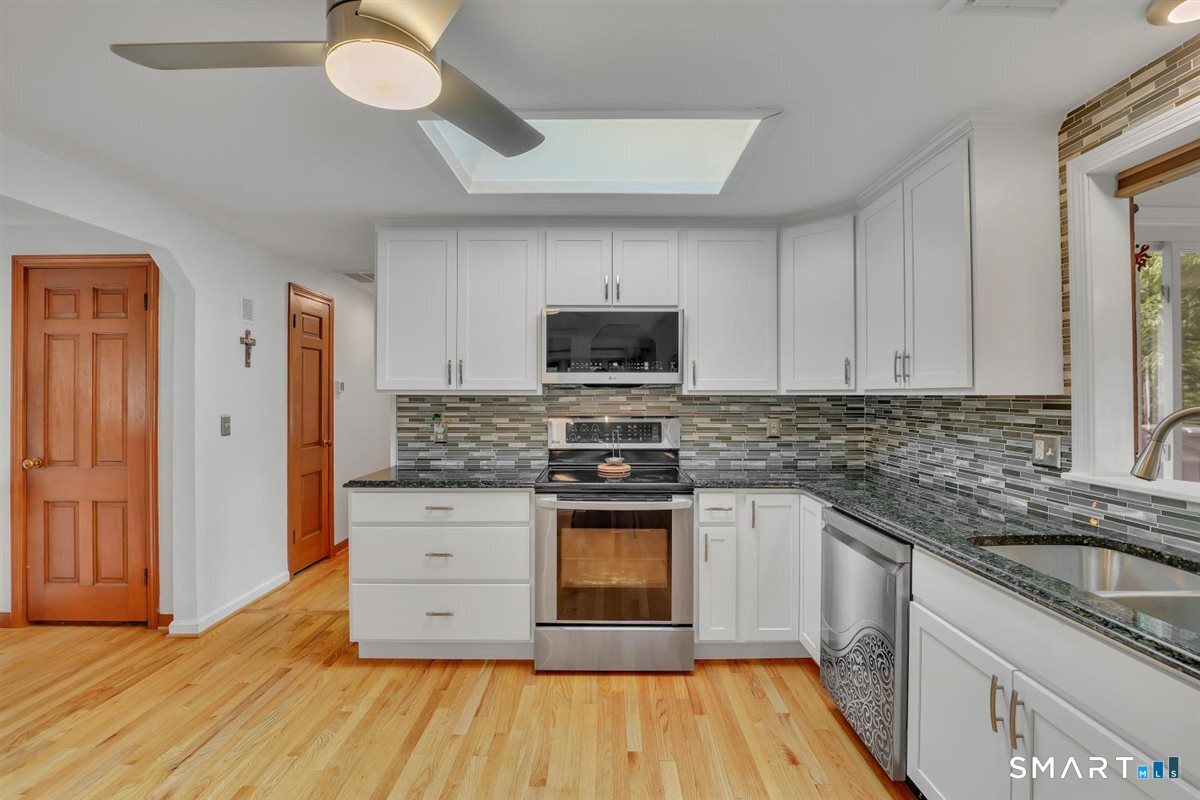 21 Silversmith Road Farmington, CT 06085 - Photo 6 of 30 Beautifully updated kitchen with loads of natural light