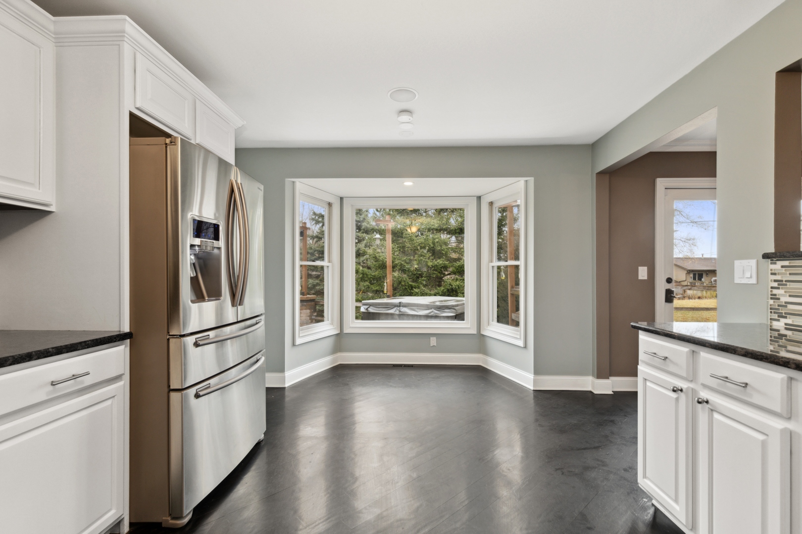 1000 Hollywood Boulevard McHenry, IL 60050 - Photo 4 of 16 a kitchen with stainless steel appliances a refrigerator sink and cabinets