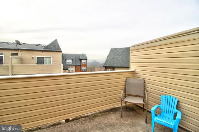 a view of a terrace with a bench