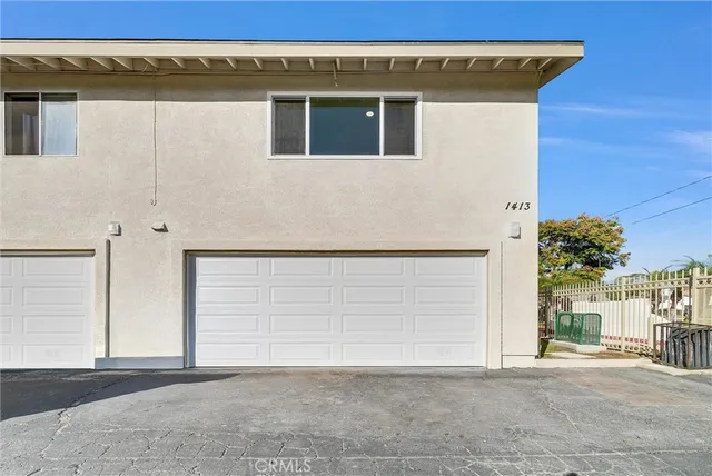 a view of a house with a garage