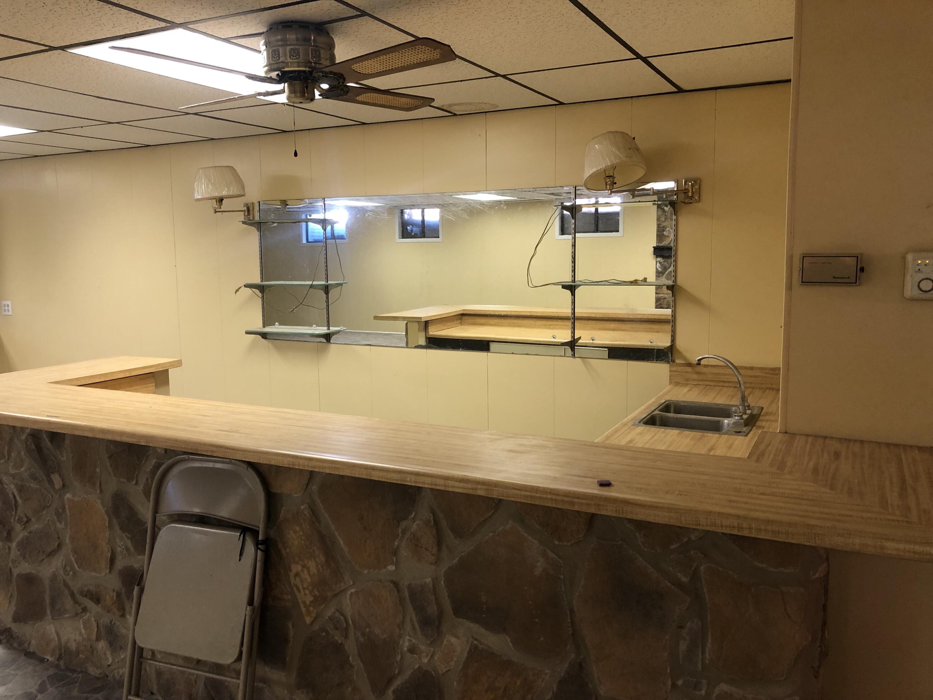 9210 Potts Creek Road Covington, VA 24426 - Photo 22 of 28 a bathroom with a sink and mirror