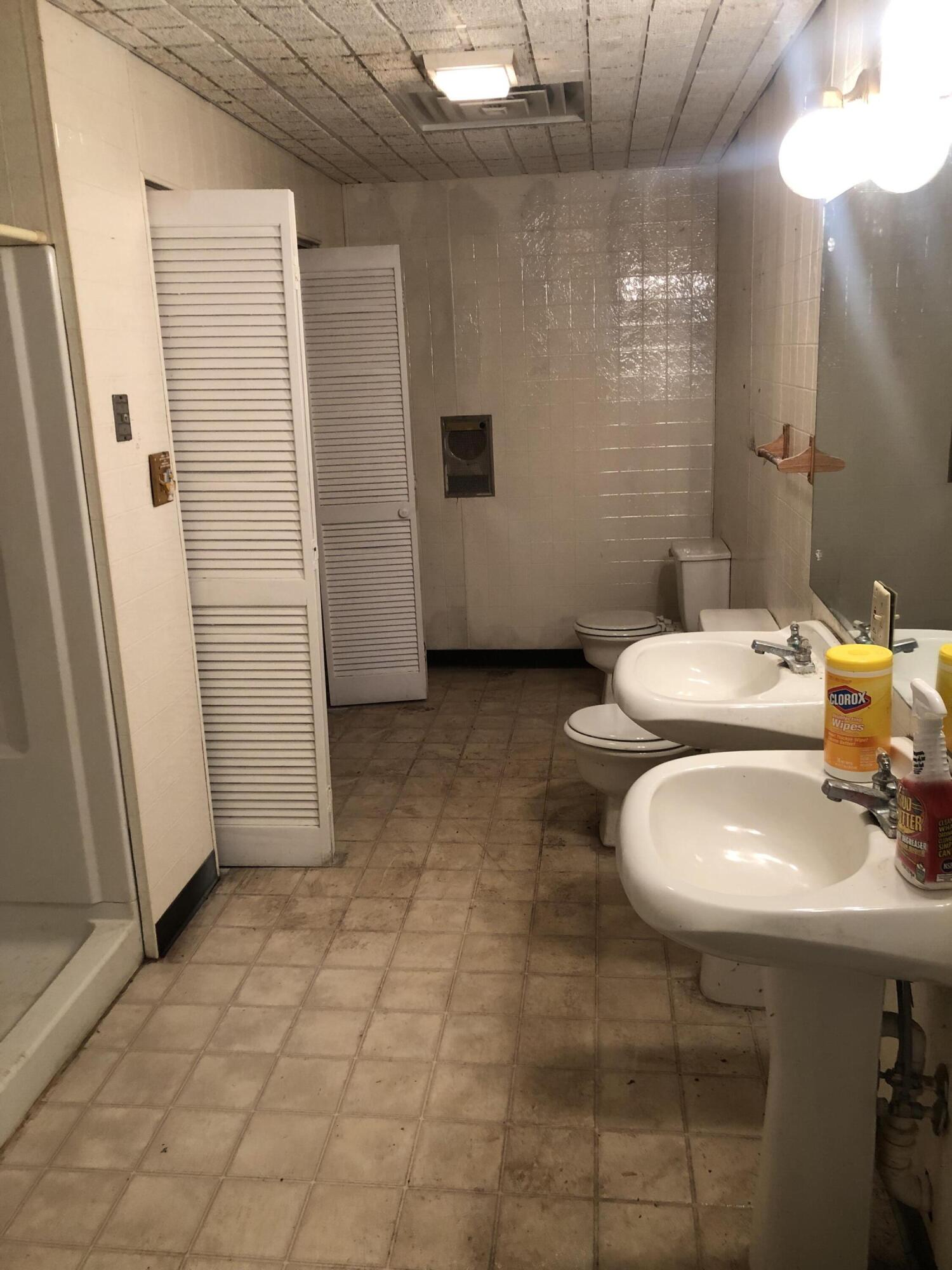 9210 Potts Creek Road Covington, VA 24426 - Photo 27 of 32 a bathroom with a sink toilet and shower