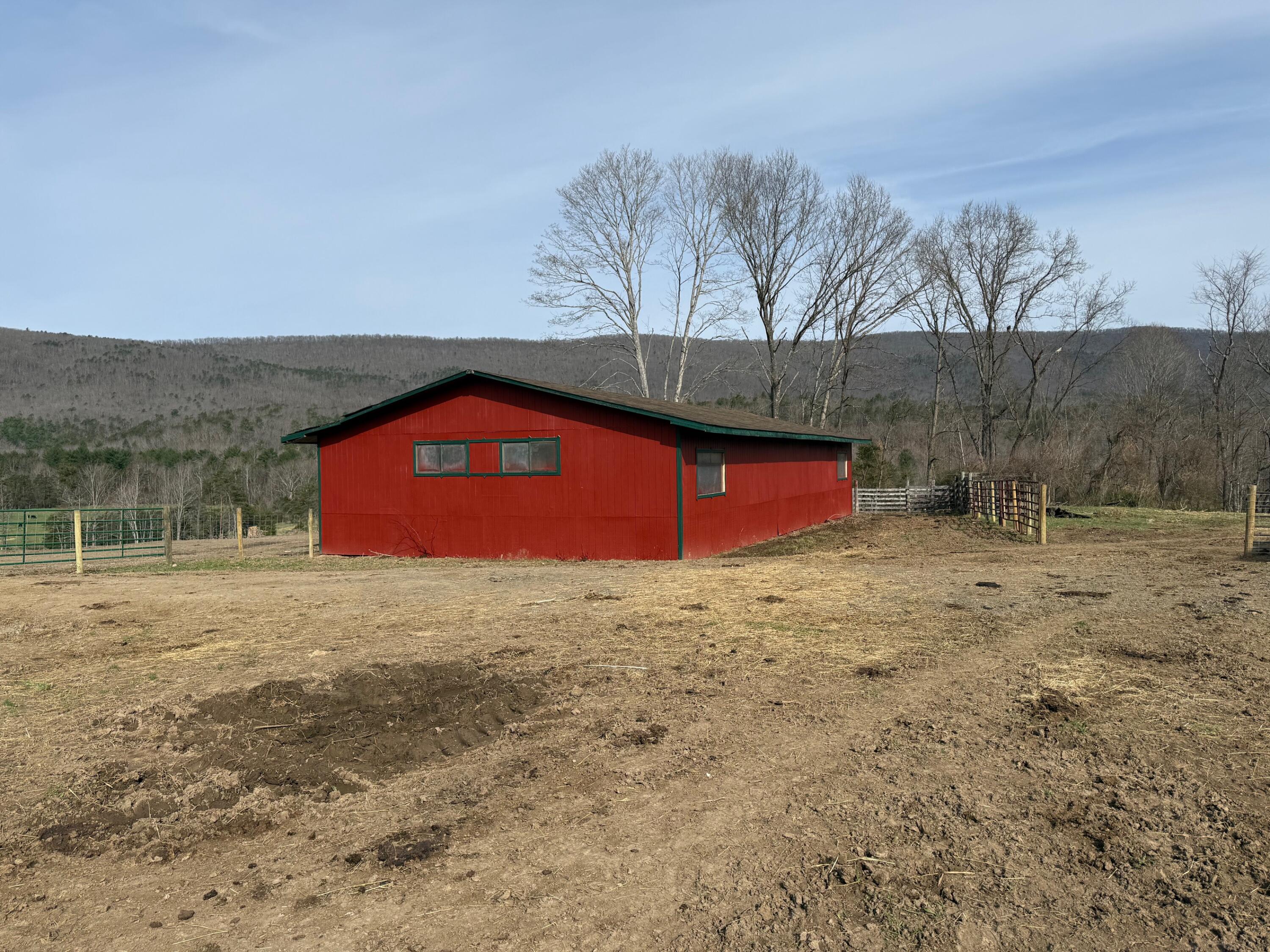 9210 Potts Creek Road Covington, VA 24426 - Photo 6 of 32 a front view of a house with a yard