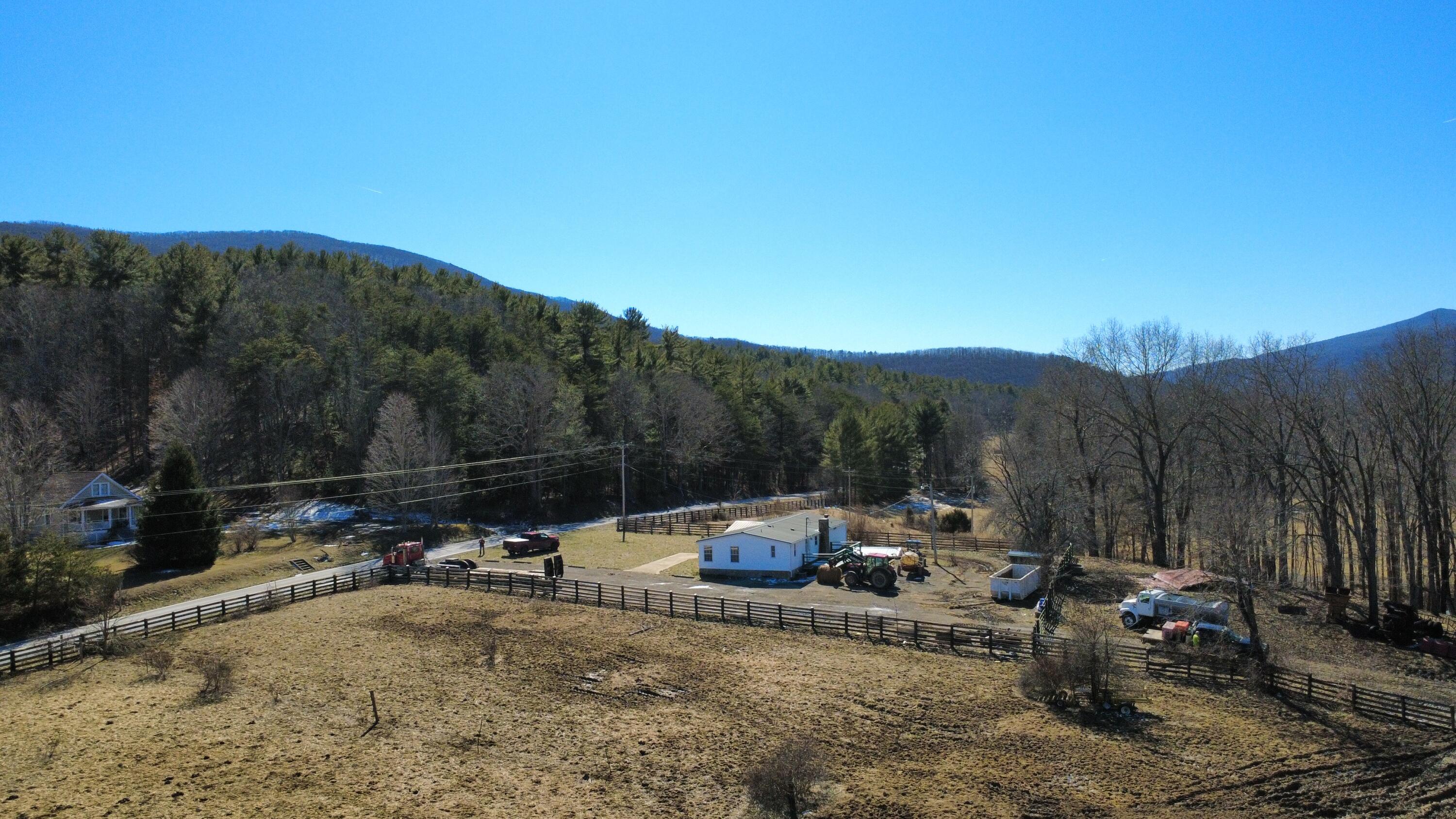 9210 Potts Creek Road Covington, VA 24426 - Photo 7 of 28 a view of a backyard with sitting area