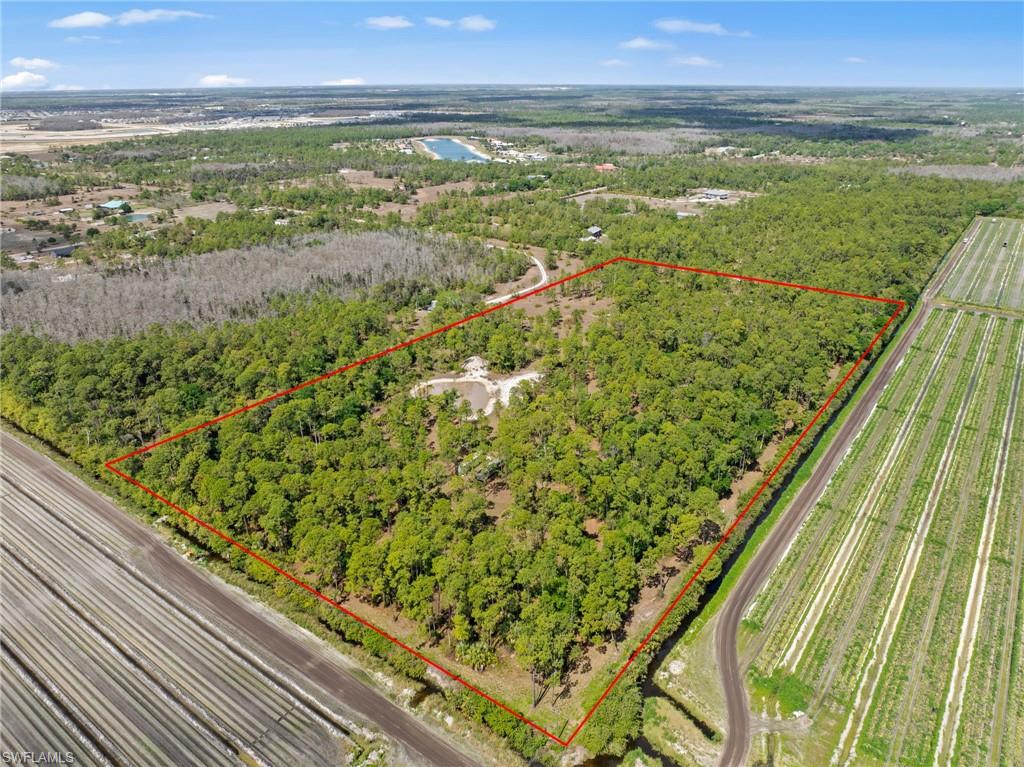 20601 Estero Pines Road Estero, FL 33928 - Photo 4 of 8 a view of an outdoor space and a lake view