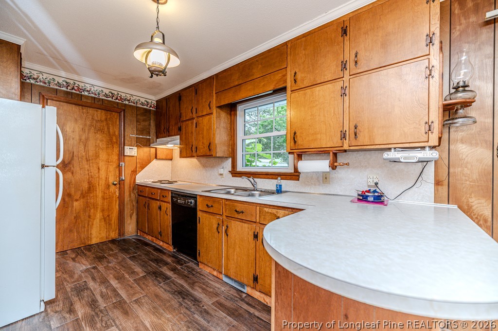 3384 Goldston Glendon Road Goldston, NC 27252 - Photo 12 of 47 a kitchen with stainless steel appliances granite countertop a sink a stove and a refrigerator