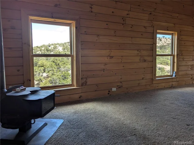 an empty room with windows