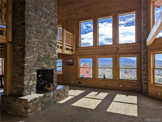 a view of a brick building with many windows