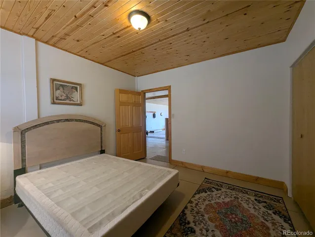 a view of a hallway with stairs