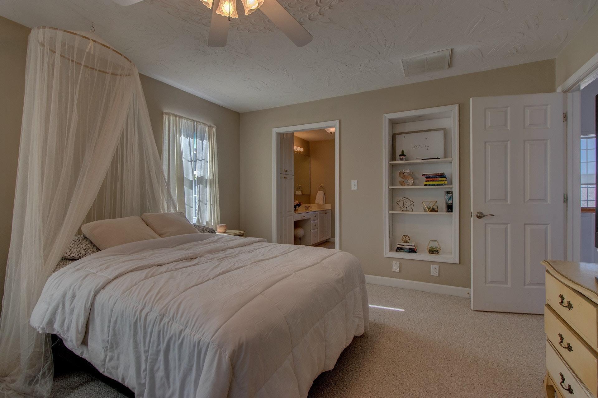 600 Dugwell Road Boones Mill, VA 24065 - Photo 12 of 78 a bedroom with a bed and a window