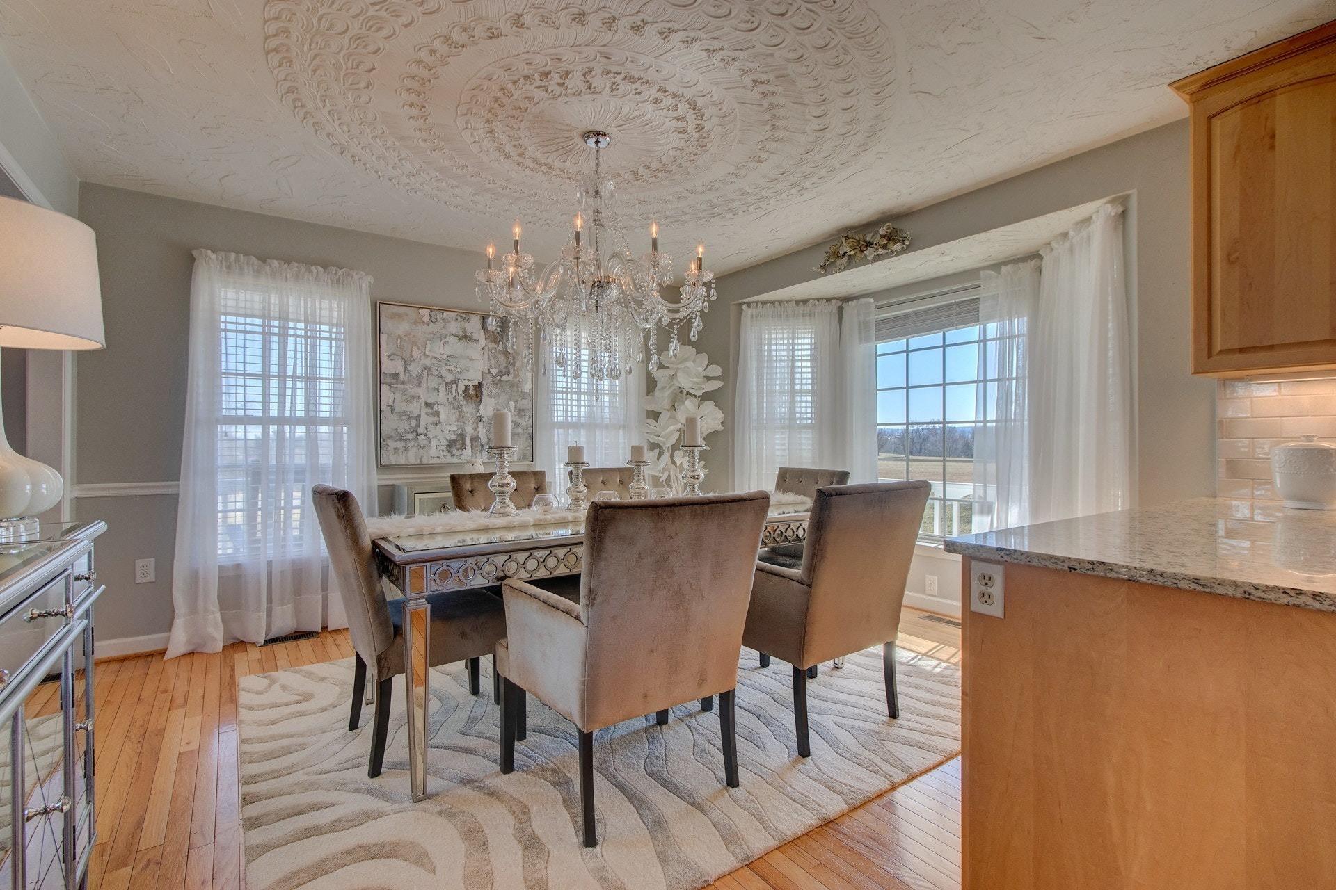600 Dugwell Road Boones Mill, VA 24065 - Photo 4 of 78 a view of a dining room with furniture window and wooden floor