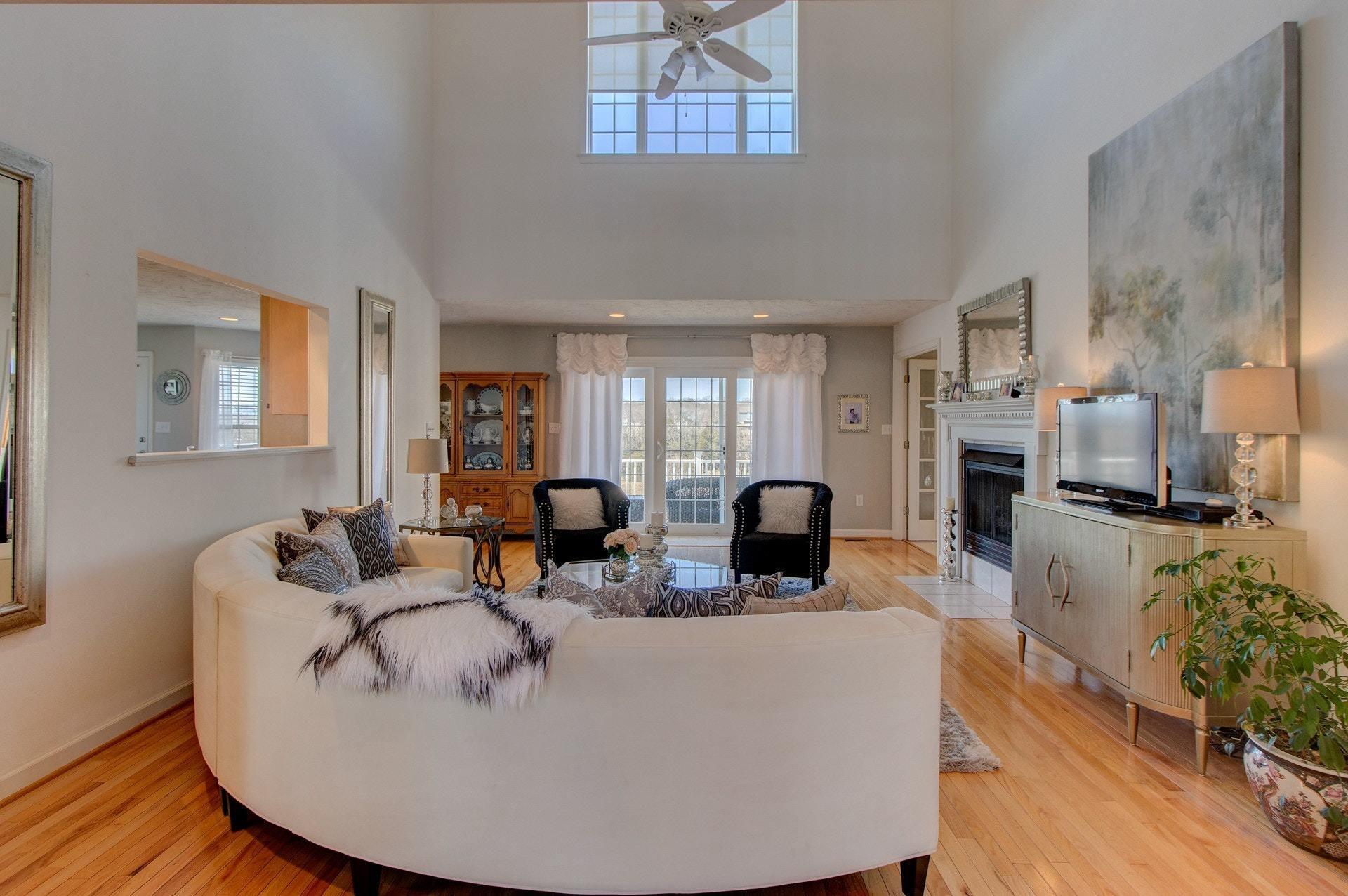600 Dugwell Road Boones Mill, VA 24065 - Photo 27 of 78 a living room with furniture and a fireplace