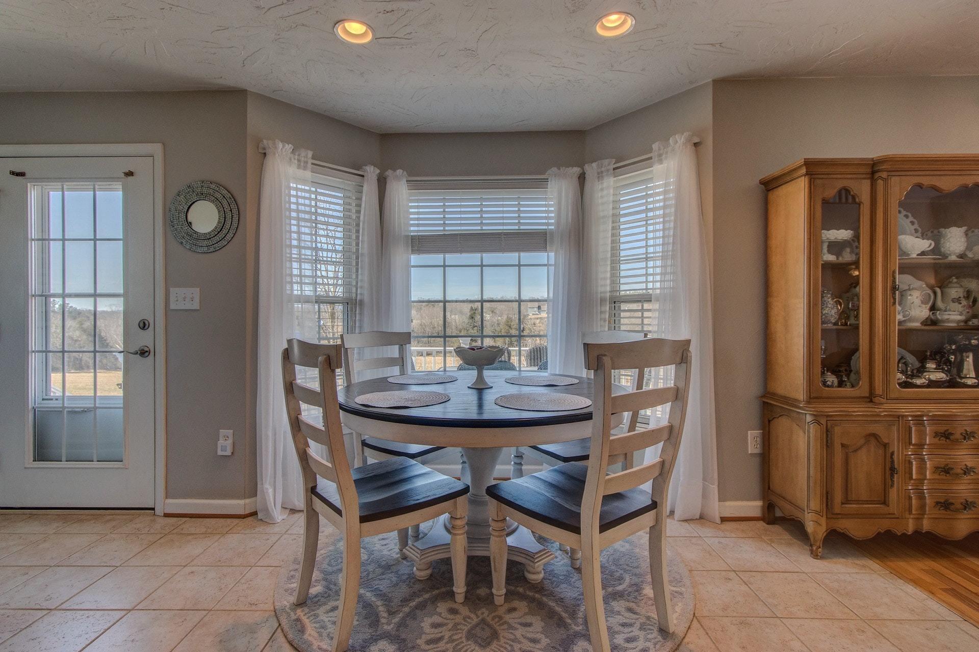 600 Dugwell Road Boones Mill, VA 24065 - Photo 40 of 78 a view of a dining room with furniture and window