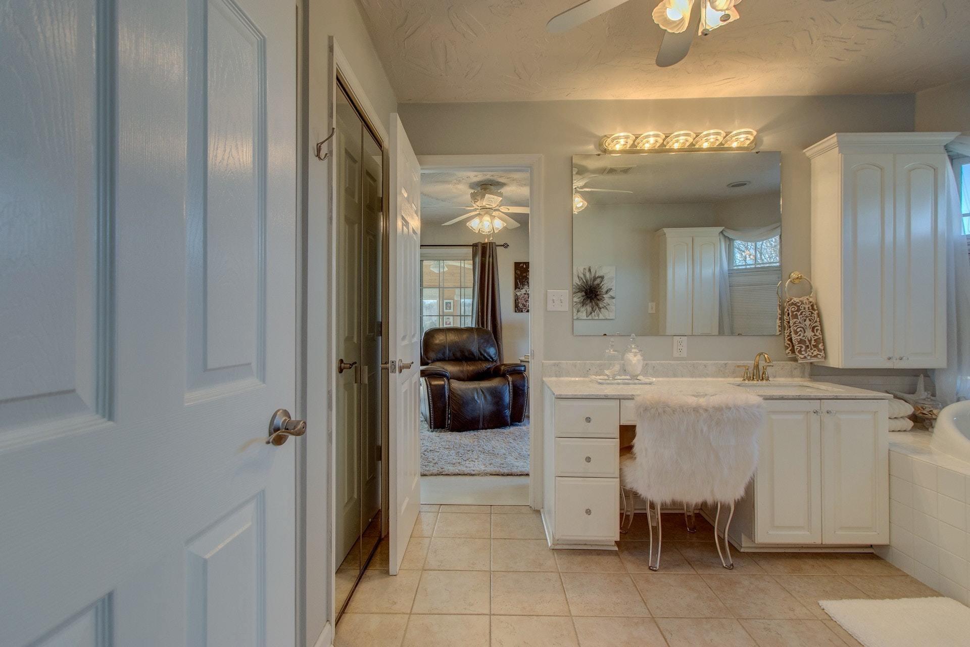 600 Dugwell Road Boones Mill, VA 24065 - Photo 43 of 78 a bathroom with a sink a toilet and a mirror