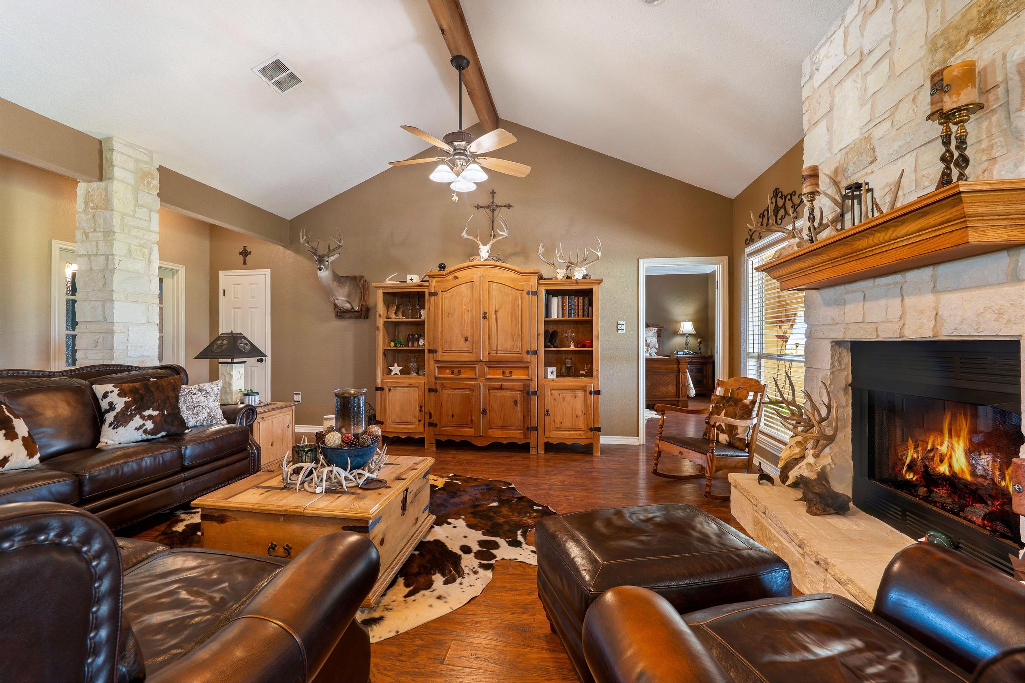 19000 Farm To Market Road 971 Granger, TX 76530 - Photo 11 of 40 The soaring ceiling features a wood beam.