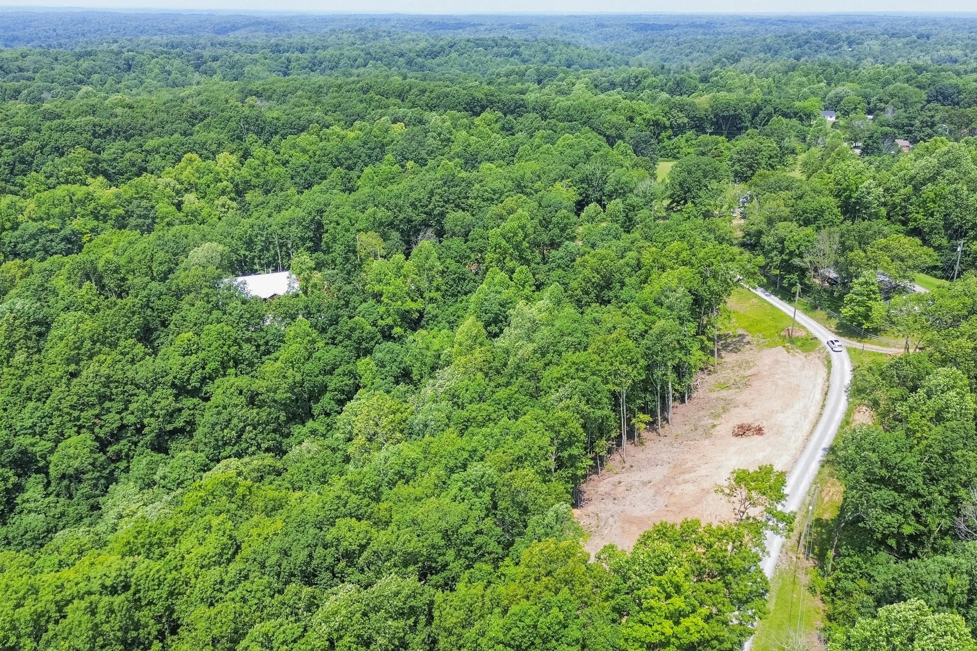 5590 Higdon Road Joelton, TN 37080 - Photo 11 of 40 an aerial view of residential house with outdoor space and trees all around