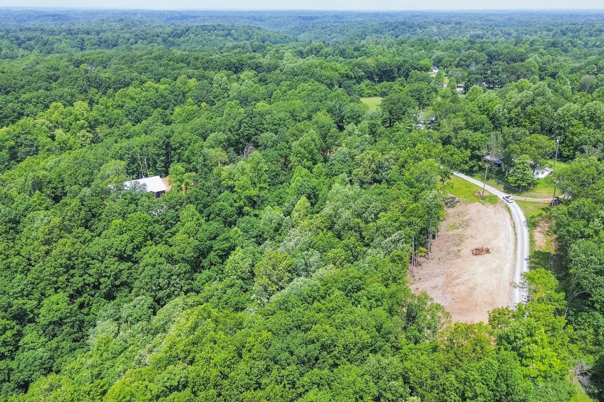 5590 Higdon Road Joelton, TN 37080 - Photo 14 of 40 an aerial view of residential house with outdoor space and trees all around