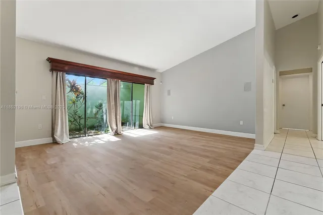 a view of an empty room and window