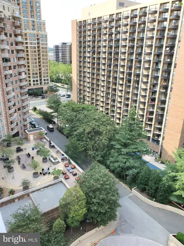 a view of a city with tall buildings