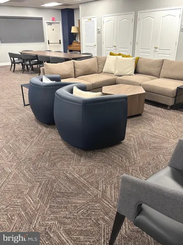 a living room with furniture and a couch