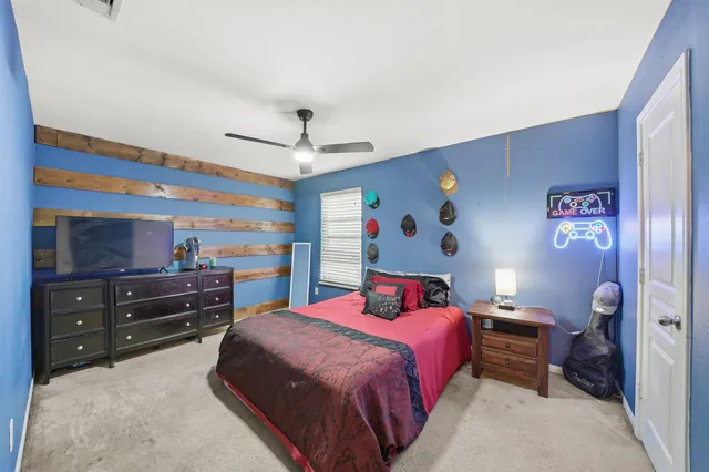 a bedroom with a bed and a closet