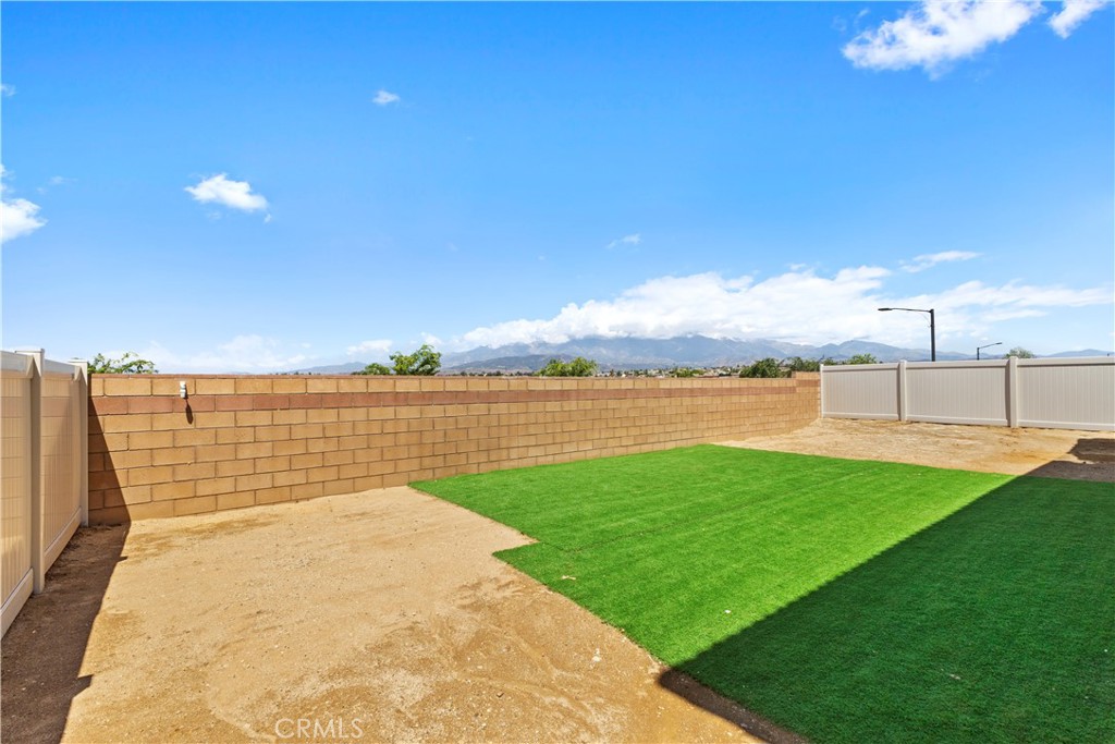 36780 Arietta Way Beaumont, CA 92223 - Photo 35 of 44 a view of a lake with a big yard