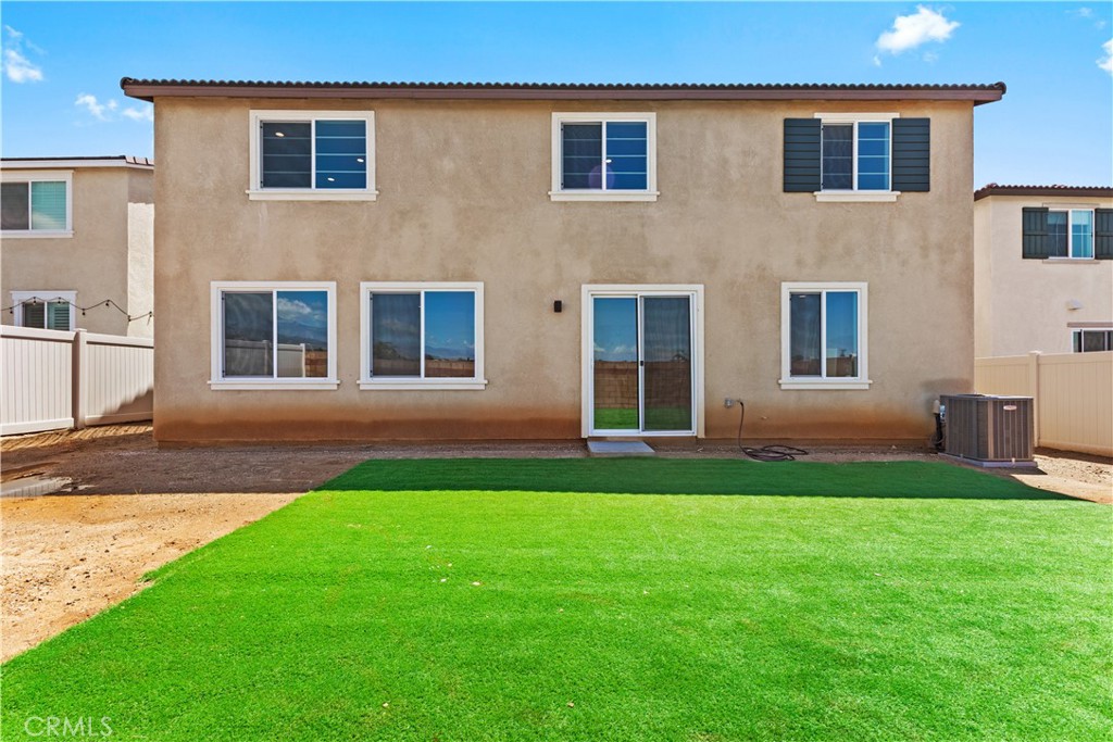 36780 Arietta Way Beaumont, CA 92223 - Photo 37 of 44 a front view of a house with garden