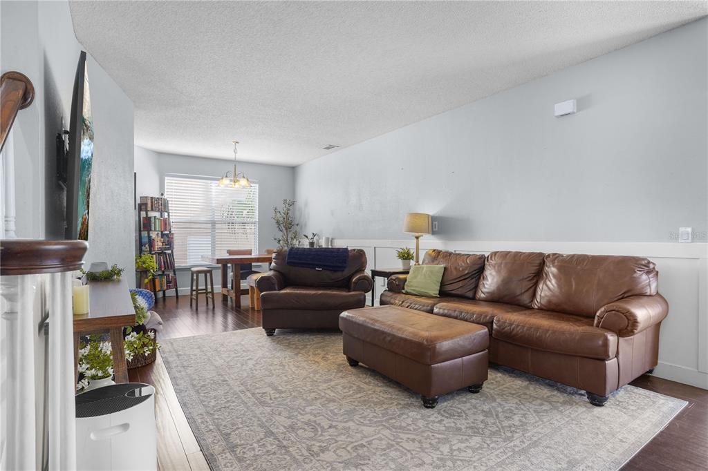 2619 Rangeley Court Orlando, FL 32835 - Photo 11 of 59 a living room with furniture and a couch